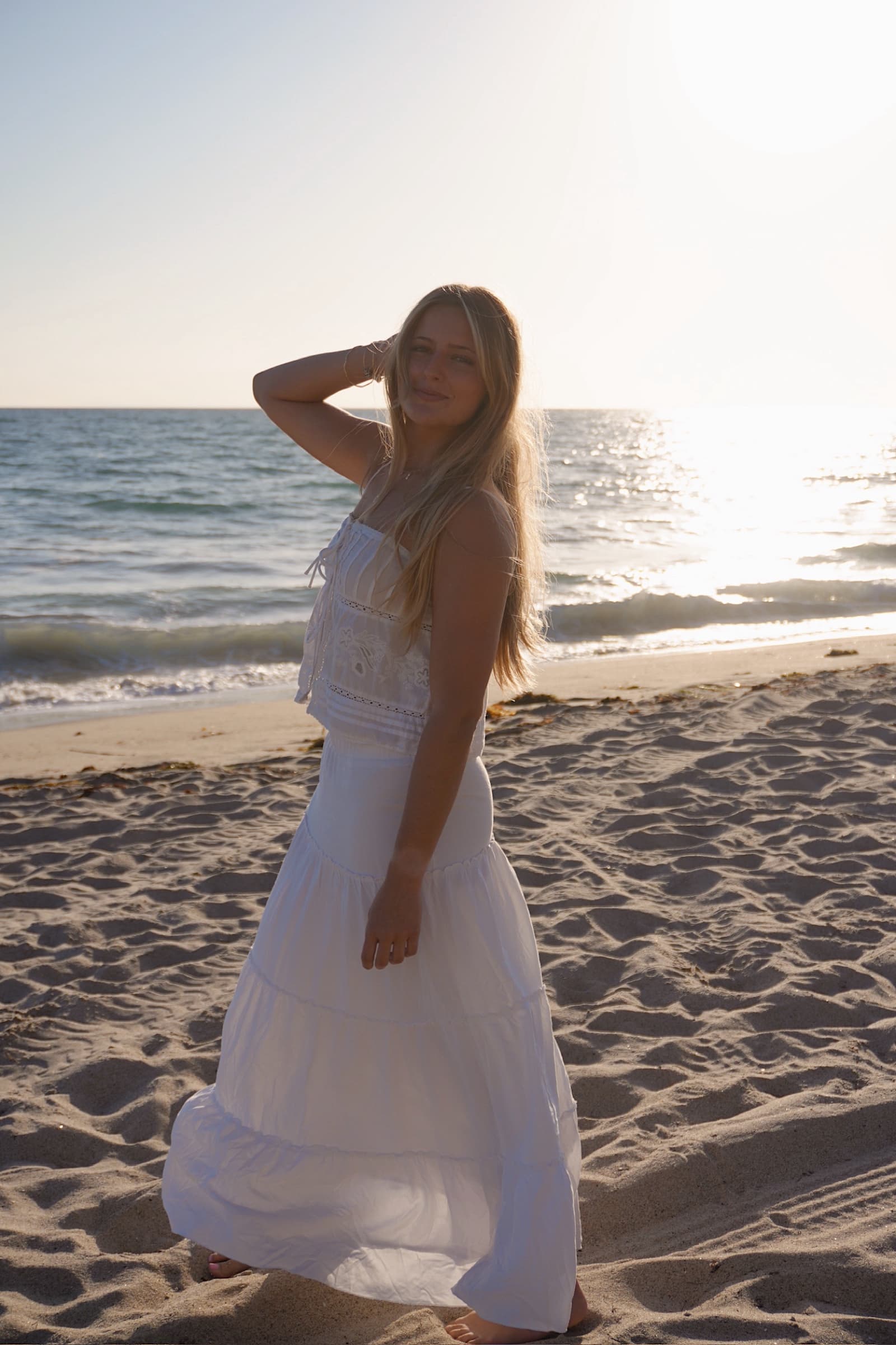 Ivory Tides handmade pearl jewelry styled with shells and sea glass